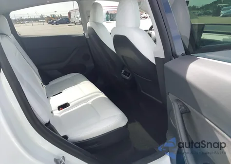 2023 Tesla Model Y из США, поврежденный, VIN 7SAYGAEE9PF792088